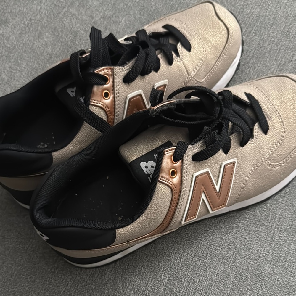 New Balance Gold and Black Sneakers